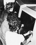 Two cabinet unit of the Galaxy Game on location. (1976)